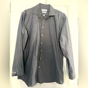 Good condition, medium tone gray with white Diamond shape spots.